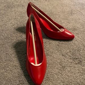 Never worn leather pumps